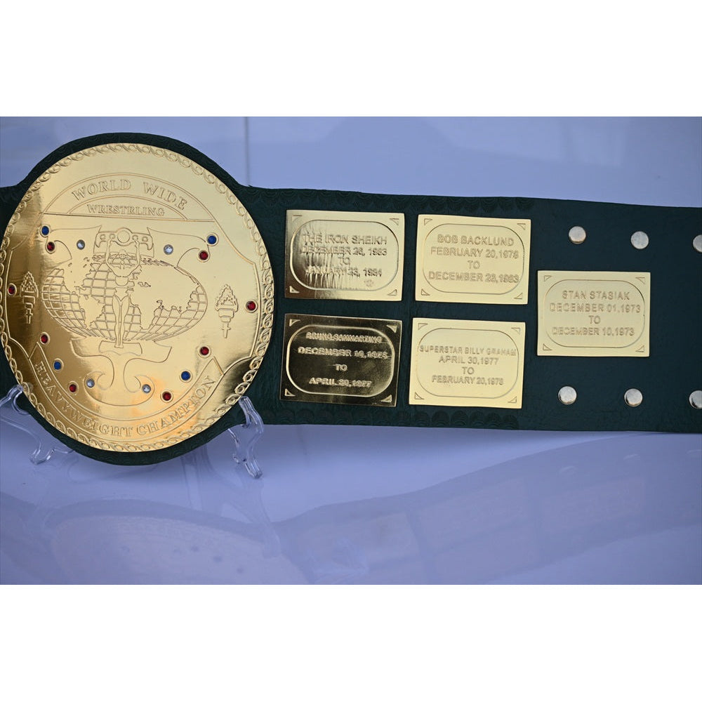 Big Green Belt WWE replica championship belt with gold plates and detailed inscriptions by Championship Belts Online