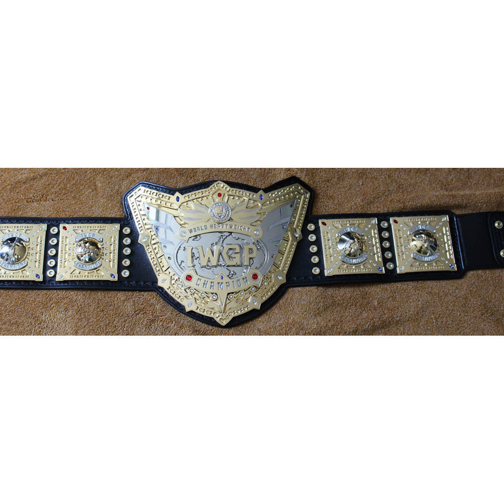 IWGP World Heavyweight Championship replica belt with gold plates and black leather strap from Championship Belts Online