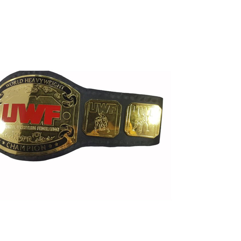 Universal Wrestling Federation heavyweight belt with gold plates and UWF logo on black strap