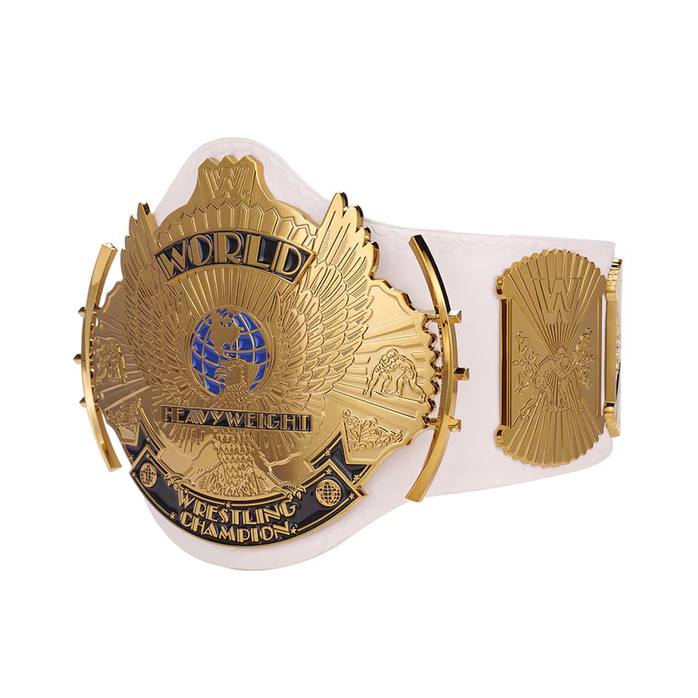 White WWE winged eagle replica belt with gold plates and detailed world heavyweight wrestling champion design