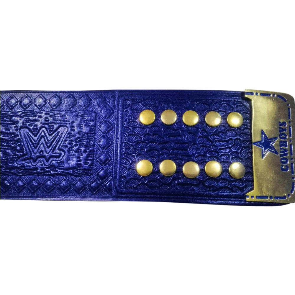 Close-up of blue WWE Cowboys championship belt strap with gold studs and embossed WWE logo